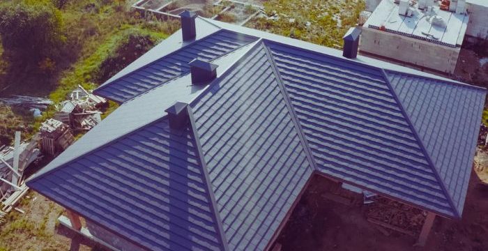 Metal roof stand in top of roofing materials