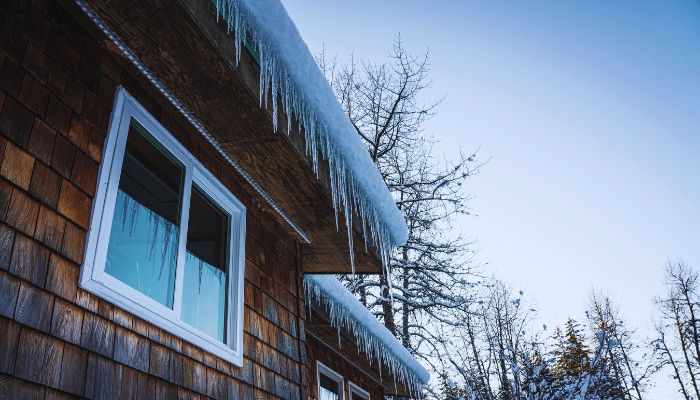 Snow and ice hanging on the roof 