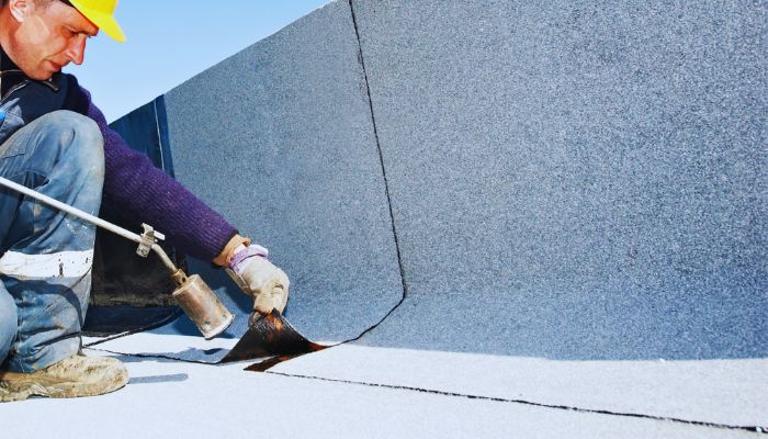 roof maintenance by worker 