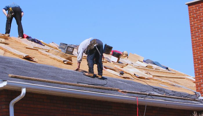 2 man working on roof restoration